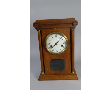 An Edwardian/Edwardian Architectural Mantle Clock with Turned Pilasters and Scrolled Top 35cm High 