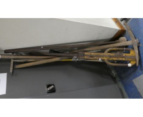 A Collection of Garden Tools to Include, Pick Axe, Turfing Spade, Tamper etc