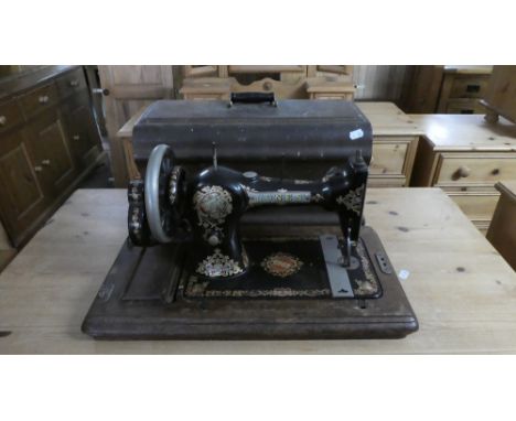 A Vintage Cased Jones Sewing Machine 