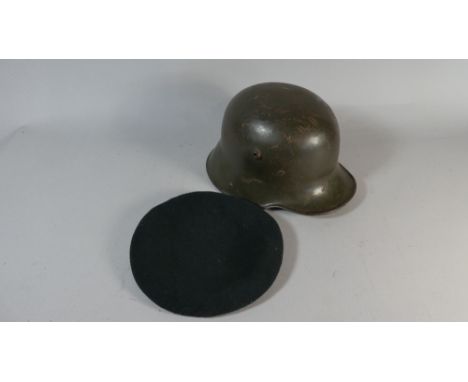 A Vintage Military Helmet and a British Army Beret with Tank Regiment Badge, Fear Naught 