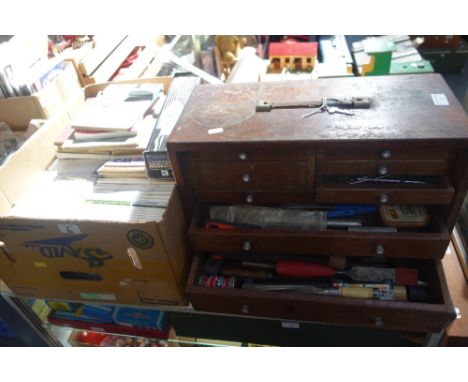 A MAHOGANY TOOL CHEST, containing model making tools, similar tools and a collection of model making booklets and 'Sam 35 Spe