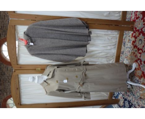 BURBERRY: A double breasted trench coat in fawn size 10 and a woven sheep's wool cloak (2)