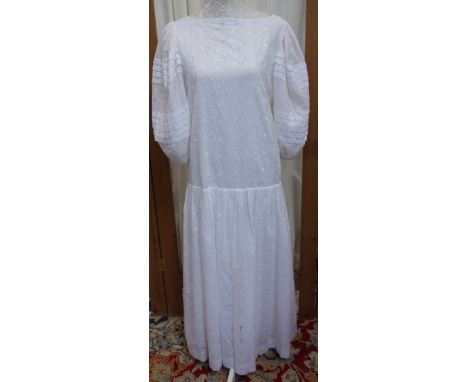 HARDY AMIES: A VINTAGE WHITE COTTON FULL LENGTH DRESS with puff sleeves, circa 1980s