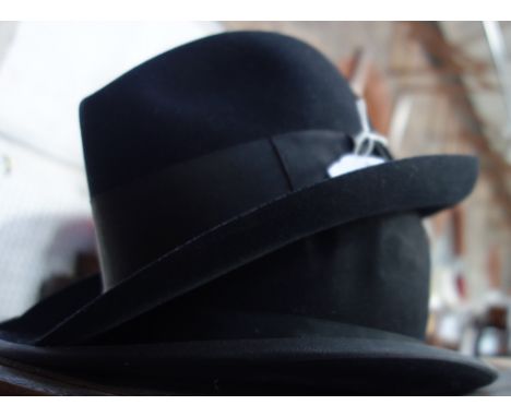A GENTLEMAN'S VINTAGE BLACK FELT trilby hat, together with a black felt bowler hat by P &amp; C Habig Wien of Berlin (2)