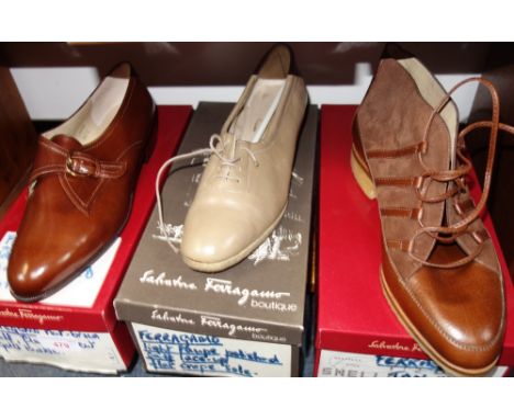 THREE PAIRS OF SHOES BY SALVATORE FERRAGAMO, one tan suede and leather laced boots size 8, another a light taupe lace-up size
