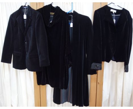 A COLLECTION OF VINTAGE BLACK VELVET JACKETS,  a long opera coat and a similar velvet dress