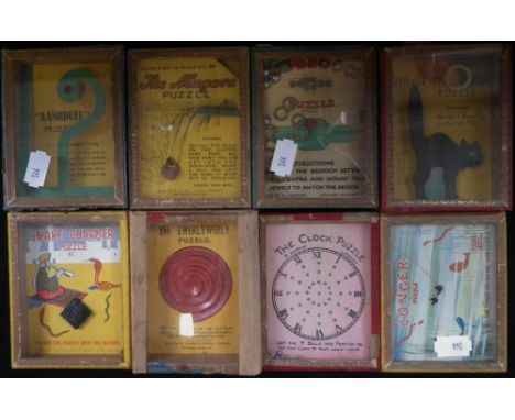 R. JOURNET LONDON; A COLLECTION OF VINTAGE 'R.J. SERIES POPULAR PUZZLES, to include 'The Twirlywirly' puzzle, circa 1920s/30s