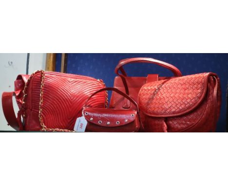 A COLLECTION OF FIVE RED LEATHER AND PVC LADIES' VINTAGE HANDBAGS and purses (as lotted)