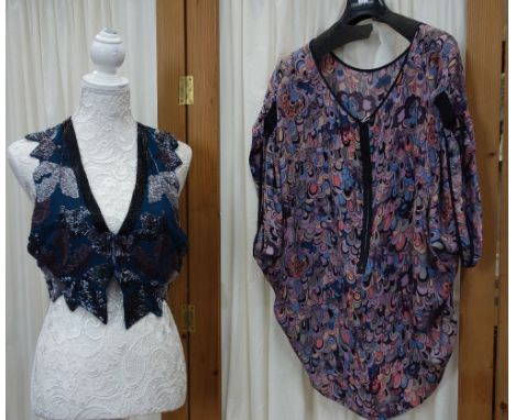 A LADY'S CHIFFON BLUE WAISTCOAT decorated throughout with bugle beads and a multi-coloured silk batwing blouse (2)