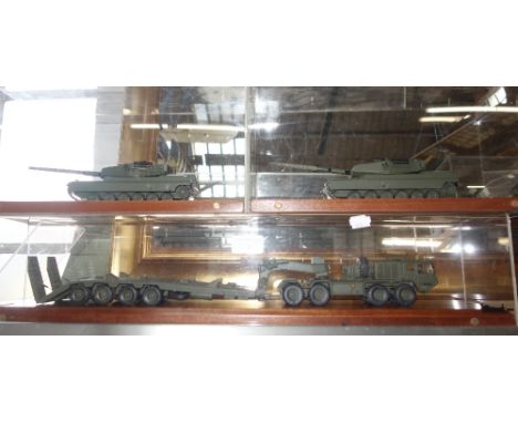 PROCUREMENT SERVICES INTERNATIONAL LTD; A SCALE MODEL OF A STINGRAY TANK within a perspex case on a wooden base, another simi