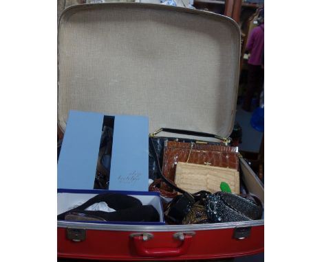 A COLLECTION OF VINTAGE LADIES HANDBAGS, Vintage ladies shoes and belts, in a red suitcase