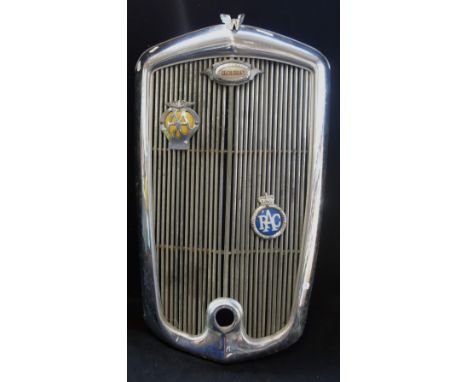 A VINTAGE WOLSLEY CHROME GRILLE off a 1930s/40s Motor Car, with an AA and RAC badge
