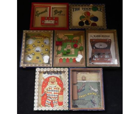 R. JOURNET &amp; CO LONDON; A COLLECTION OF VINTAGE 'R.J. SERIES PUZZLES, to include 'The Radio Puzzle' put the valves in the