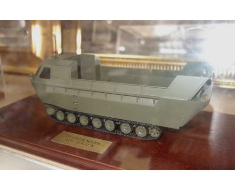 PROCUREMENT SERVICES INTERNATIONAL LTD; A SCALE MODEL OF A GLOVER WEBB AQUATRACK  in a perspex case on a teak base