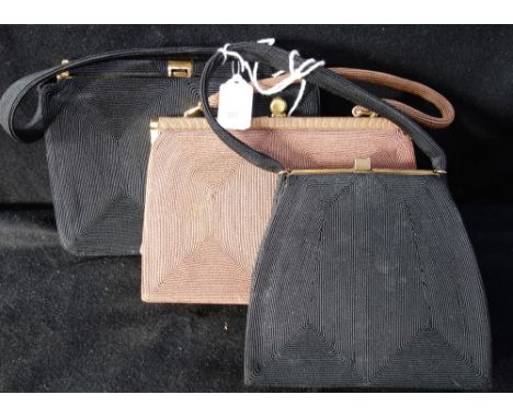 A LADY'S VINTAGE BLACK HANDBAG in cord, another similar and another example in brown cord material C. 1940's (3)
