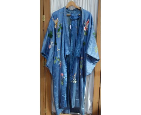 A VINTAGE SKY BLUE SILK FULL LENGTH KIMONO with tie belt, the Kimono decorated throughout with embroidered flowers and leaves