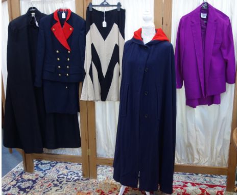 BETTY BARCLAY: A lady's vintage double breasted jacket and skirt suit in navy blue edged with red fastened with gold embossed