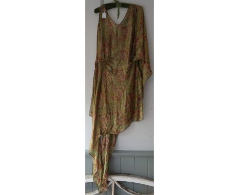 A VINTAGE 1920'S FLAPPER DRESS, sleeveless with a V neck line, the dress fashioned from patterned chiffon depicting pink and 