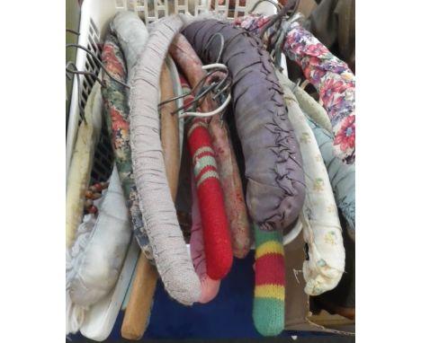 A COLLECTION OF COVERED VINTAGE CLOTHES HANGERS (as lotted)
