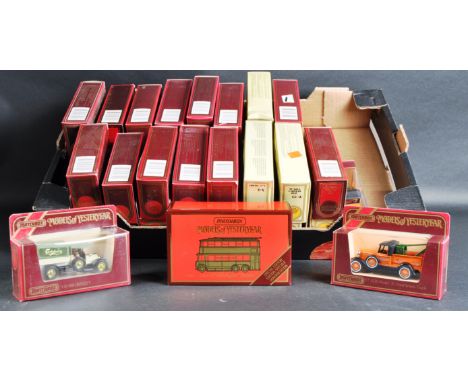 A large collection of approximately 30 assorted vintage Matchbox Models of Yesteryear / “ Y Series “ diecast model cars and o