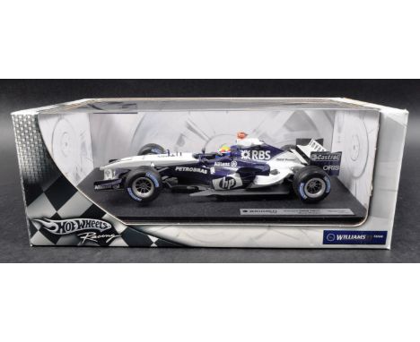 A Hot Wheels 1/18 scale boxed diecast model F1 Formula One racing car comprising; Williams F1 Team, Williams BMW FW27 – Mark 