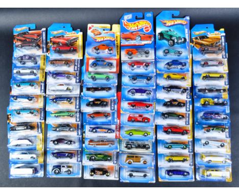 A large collection of approximately x50 carded Mattel made Hot Wheels diecast model cars to include; 2010 Ford Mustang GT, 66