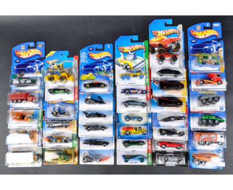 A large collection of approximately x40 carded Mattel made Hot Wheels diecast model cars to include; Dark Rider Series II (mu