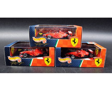 A collection of 3x Mattel made Hot Wheels 1/43 scale boxed diecast model F1 Formula One racing cars comprising; 1 x 1999 Ferr