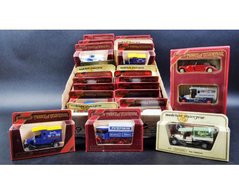 A large collection of approximately 30 assorted vintage Matchbox Models of Yesteryear / “ Y Series “ diecast model cars and o