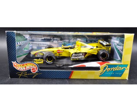 A Hot Wheels 1/18 scale boxed diecast model F1 Formula One racing car comprising; Jordon Mugen Honda 199 Launch Version – Dam