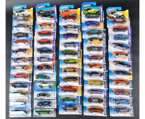 A large collection of approximately x50 carded Mattel made Hot Wheels diecast model cars to include; 72 Ford Gran Torino Spor