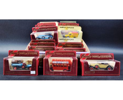 A large collection of approximately 30 assorted vintage Matchbox Models of Yesteryear / “ Y Series “ diecast model cars and o