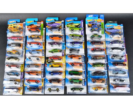 A large collection of approximately x50 carded Mattel made Hot Wheels diecast model cars to include; Ford Oval Pass N Gasser,