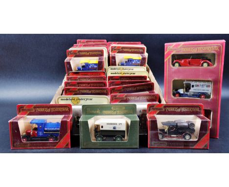 A large collection of approximately 30 assorted vintage Matchbox Models of Yesteryear / “ Y Series “ diecast model cars and o