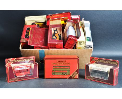 A large collection of approximately 30 assorted vintage Matchbox Models of Yesteryear / “ Y Series “ diecast model cars and o