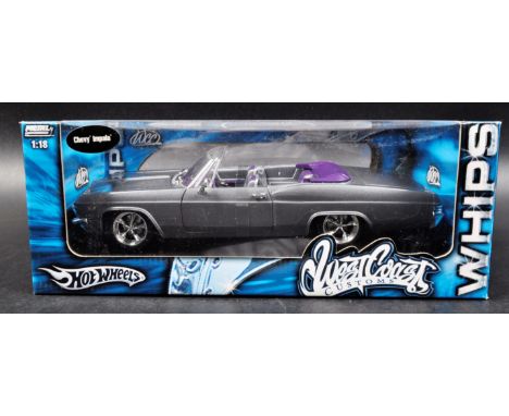 &nbsp;A Hot Wheels 1/18 scale boxed diecast model car comprising; Chevy Impala - West Coast Customs&nbsp; Metal Collection Ed