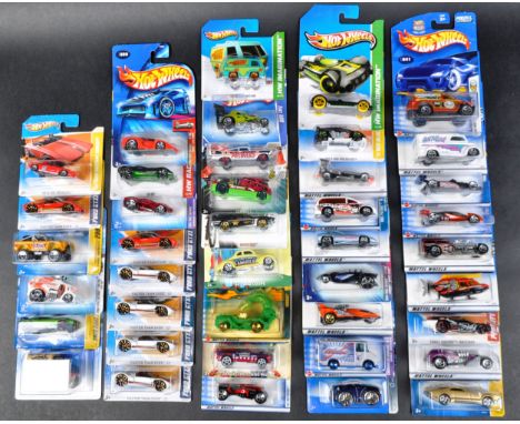 A large collection of approximately x40 carded Mattel made Hot Wheels diecast model cars to include; 2004 First Editions “ To