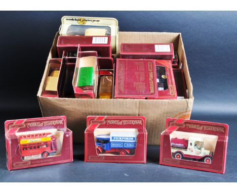 A large collection of approximately 30 assorted vintage Matchbox Models of Yesteryear / “ Y Series “ diecast model cars and o