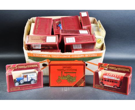 A large collection of approximately 30 assorted vintage Matchbox Models of Yesteryear / “ Y Series “ diecast model cars and o