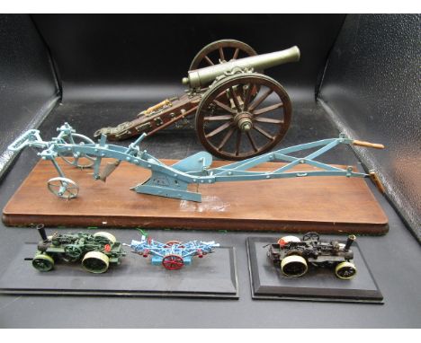 Cannon, plough and 2 steam engine models