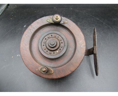 A wooden vintage boat reel