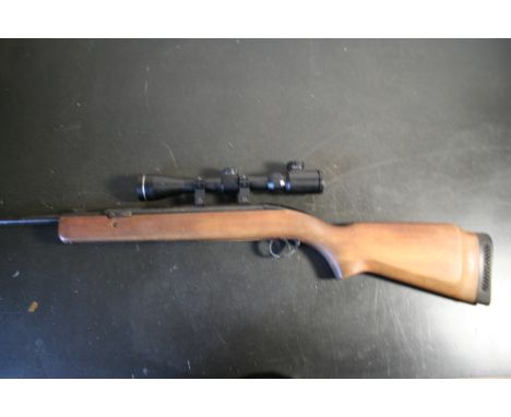 BSA air rifle with a 3-9X40E scope in case