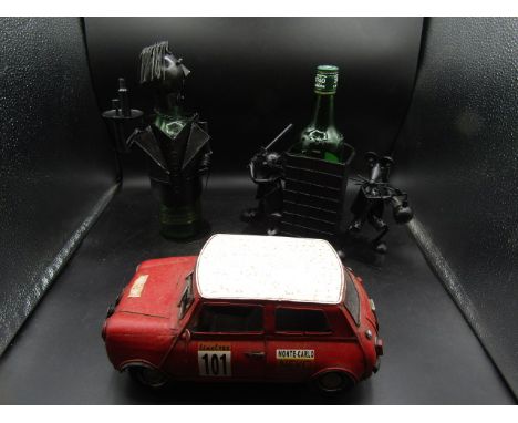 2 metal novelty bottle holders and Monte Carlo mini model