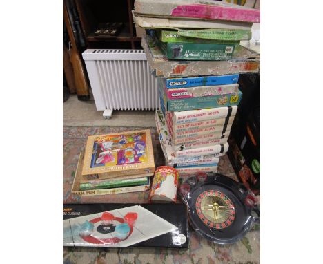 Vintage boxed Jig Map puzzles and various games puzzle boxes have been stored damp so some are a/f, contents seem ok