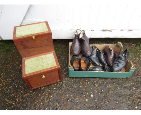 A shoe shine seat with contents along with vintage shoe lasts