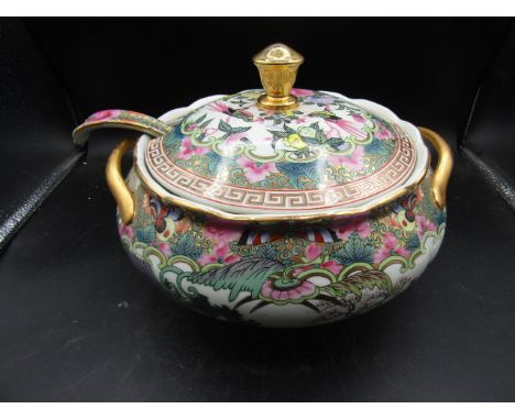 An Oriental tureen with ladle 29cm dia
