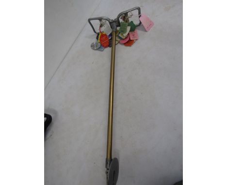 A ladies shooting stick with vintage horse show tags