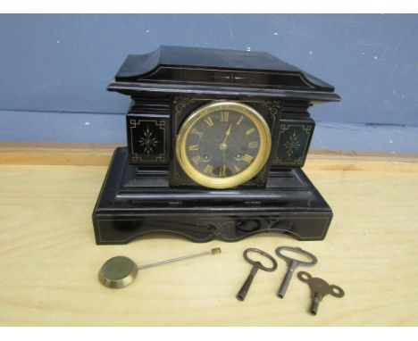 Black slate mantel clock with pendulum and key