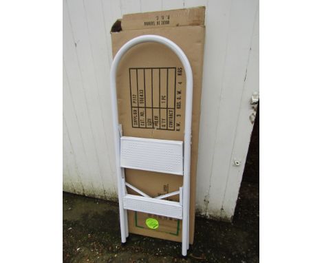 Unused metal step ladder in box