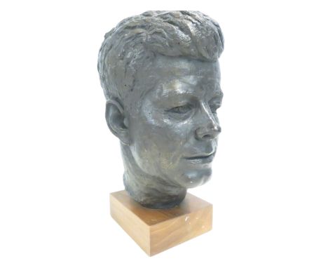 Bronze effect bust in the form of J.F.K on wooden base by Austin dated 1964. Height 36cm